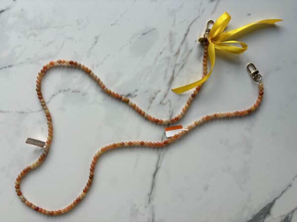 Chaine de téléphone en aventurine orange pour apporter la joie
