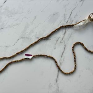 Chaine de téléphone en bois fossile et son pouvoir de stabilité